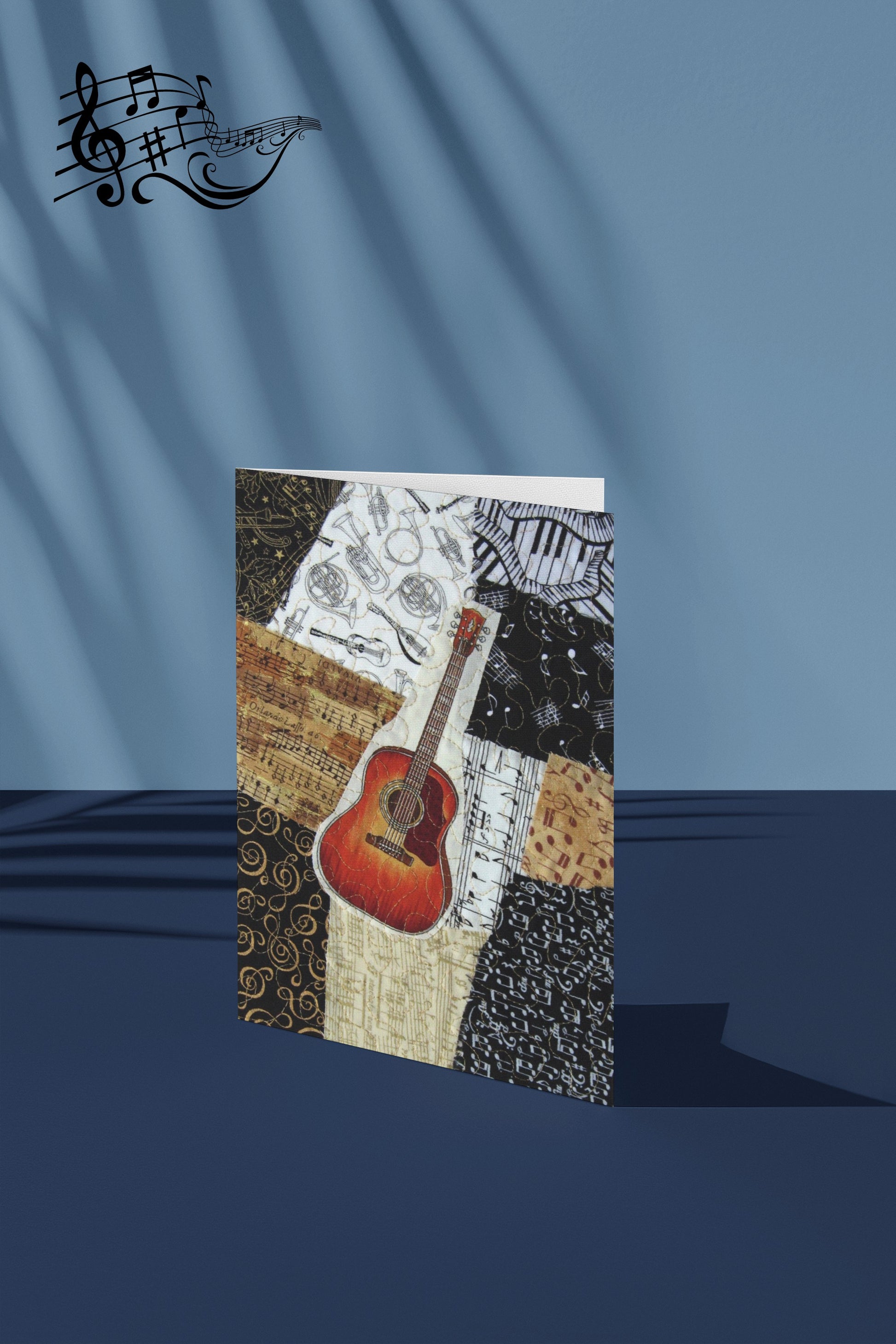 Greeting card with guitar design on a blue background