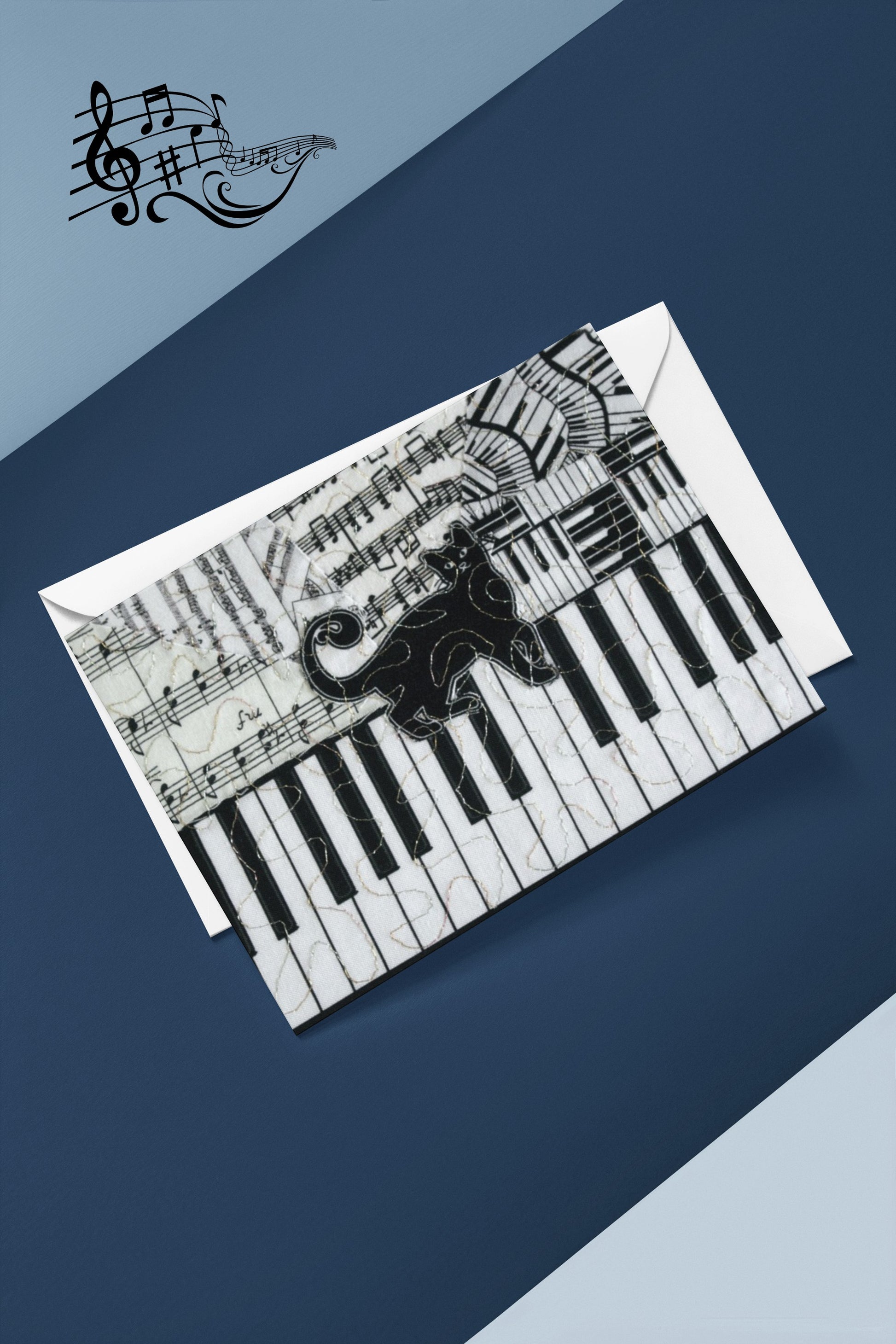 Greeting card with piano keyboard design and music notes on a blue background