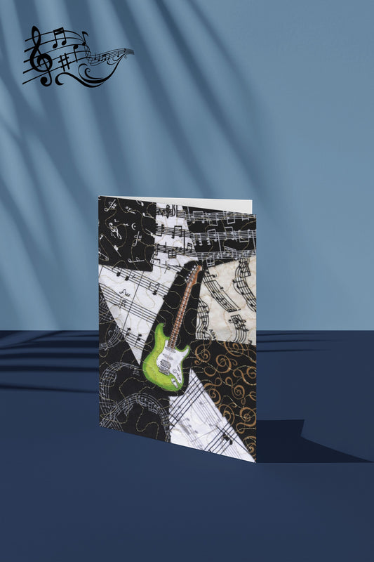 Greeting card with a green electric guitar design on a blue background